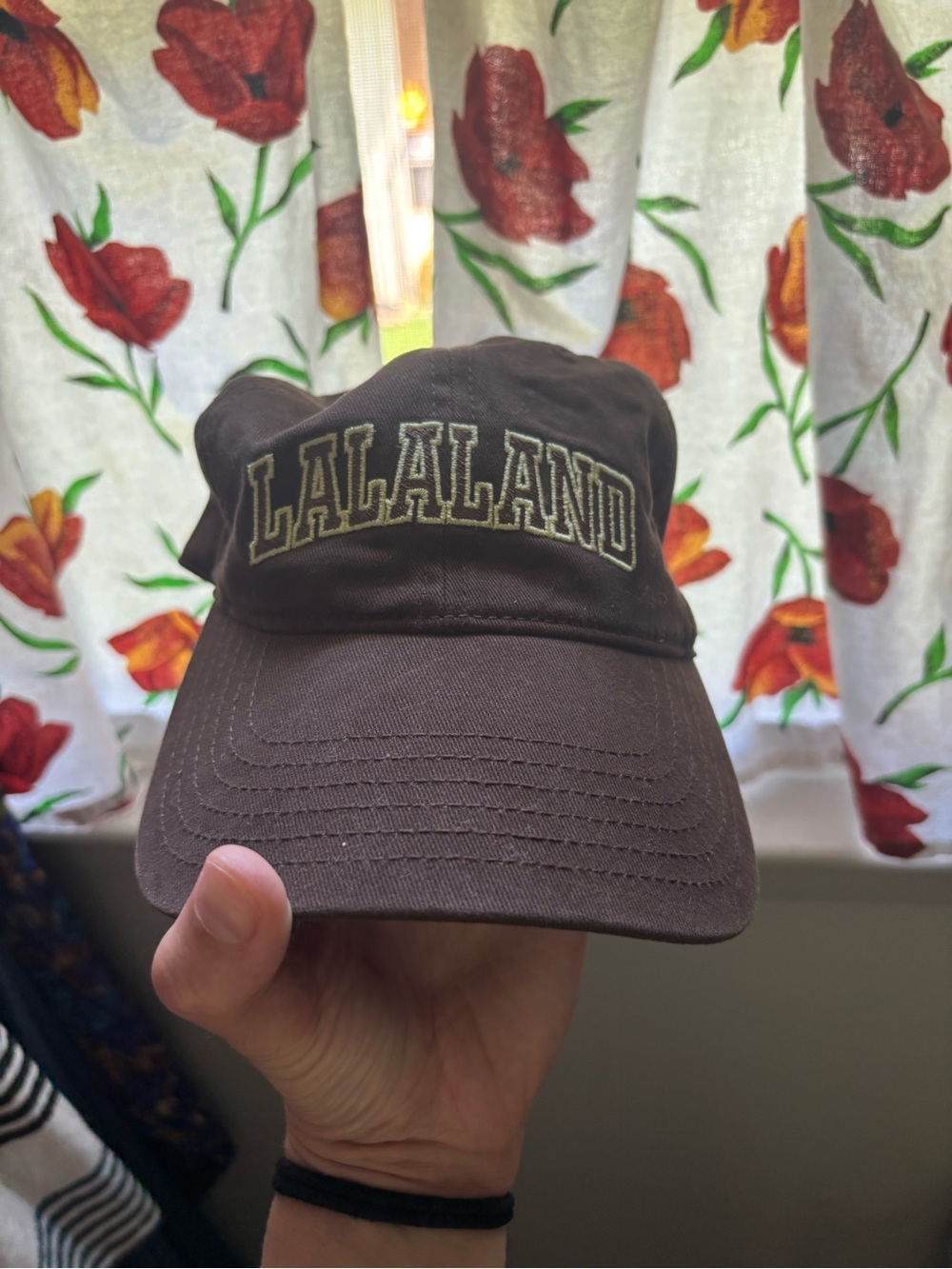 Dressed in Lala LALALAND baseball hat